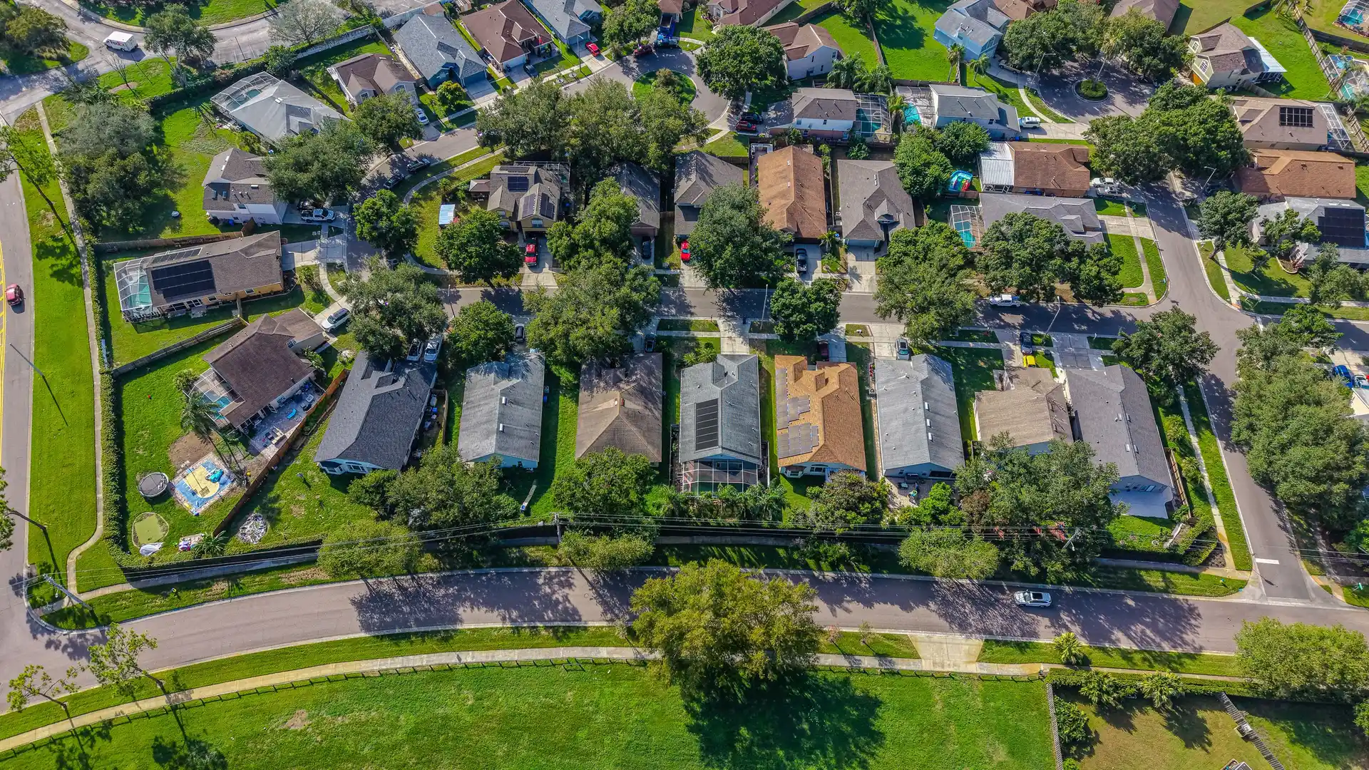 Aerial view of a tree-lined Florida neighborhood