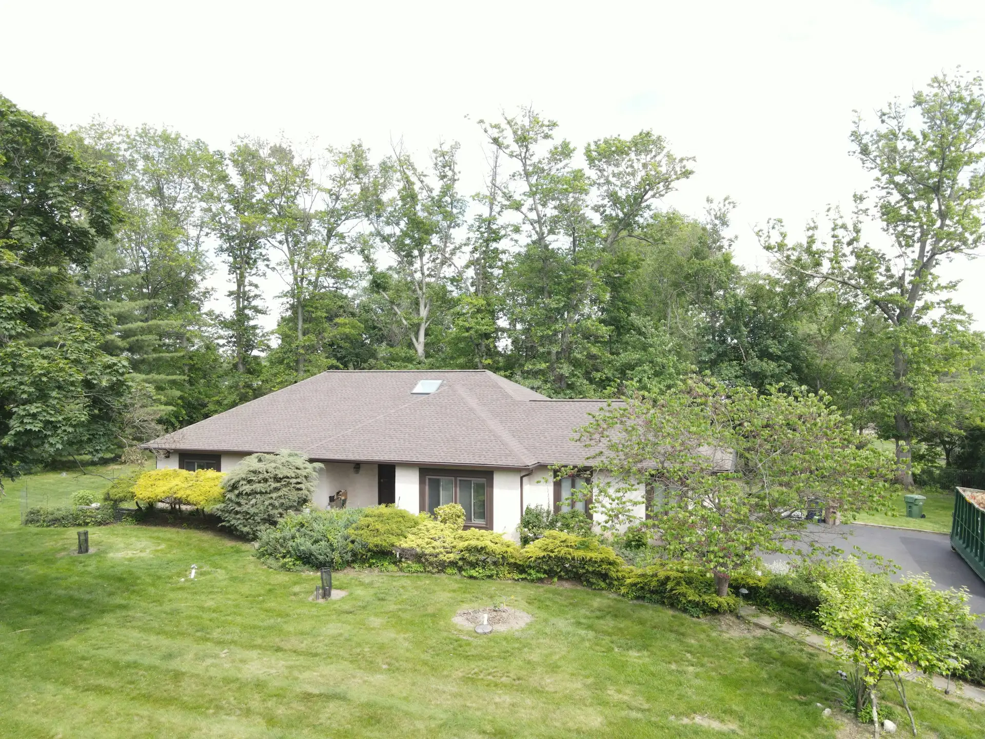 Single-story home with an asphalt shingle roof